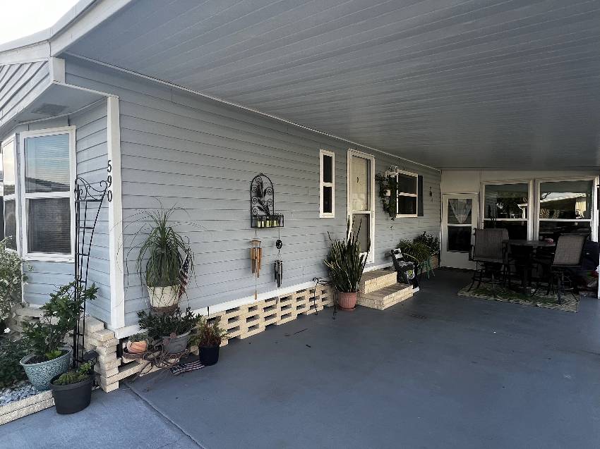 Winter Haven, FL Mobile Home for Sale located at 590 Century Drive Hidden Golf Club